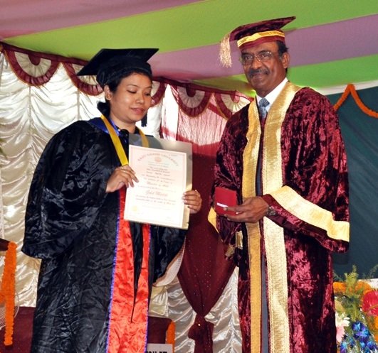 Chancellor, Rajiv Gandhi University, Air Marshal (Retd.) Pranab Kumar Barbora, awarding the Doctorate Degree to a candidate in the 13th University Convocation of Rajiv Gandhi University (RGU), Rono Hills, Doimukh in the University campus on 30th November 2015.